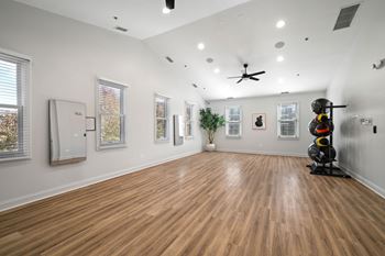 Yoga and wellness studio with echelon reflect fitness mirrors offering on-demand exercise programs
